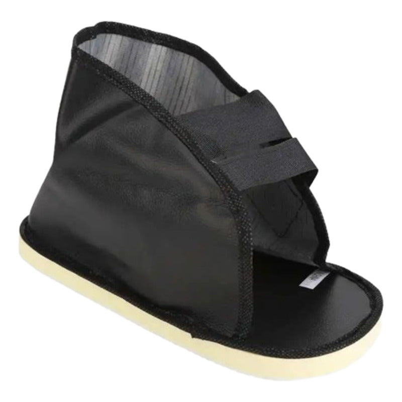 Zapato ortopédico negro vista lateral con suela antideslizante