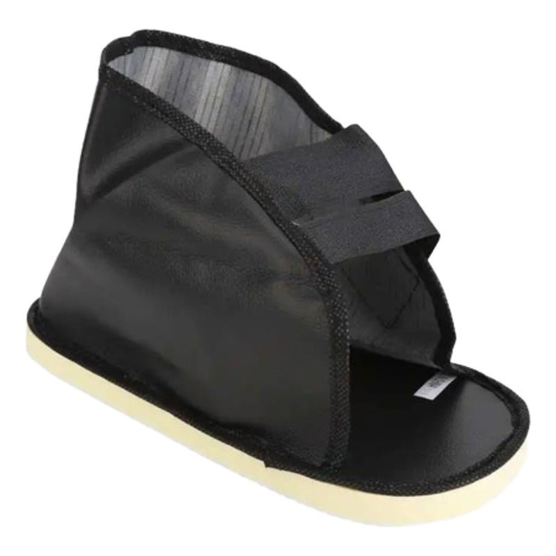 Zapato ortopédico negro vista lateral con suela antideslizante